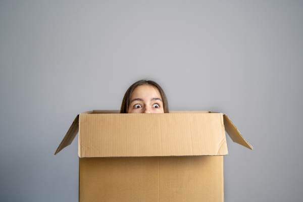 image: peeking out from a box